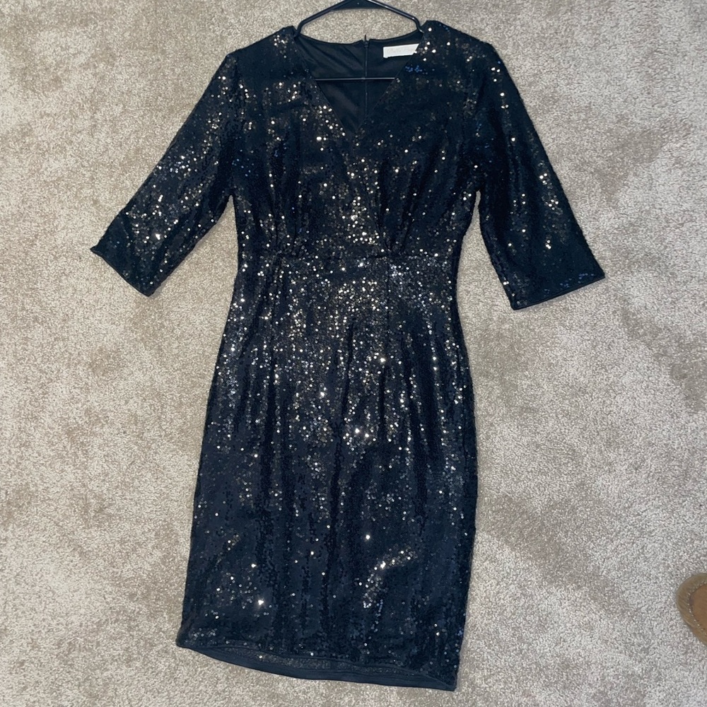 Black sequin cocktail dress. Perfect for a party or as a wedding guest